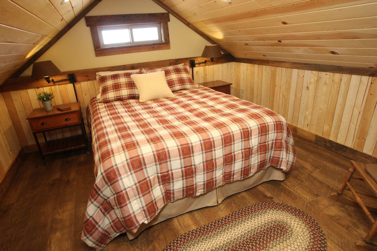 Upstairs you will find a queen sized bed and a centralized, remote controlled AC/Heating system to ensure a comfortable night's rest.