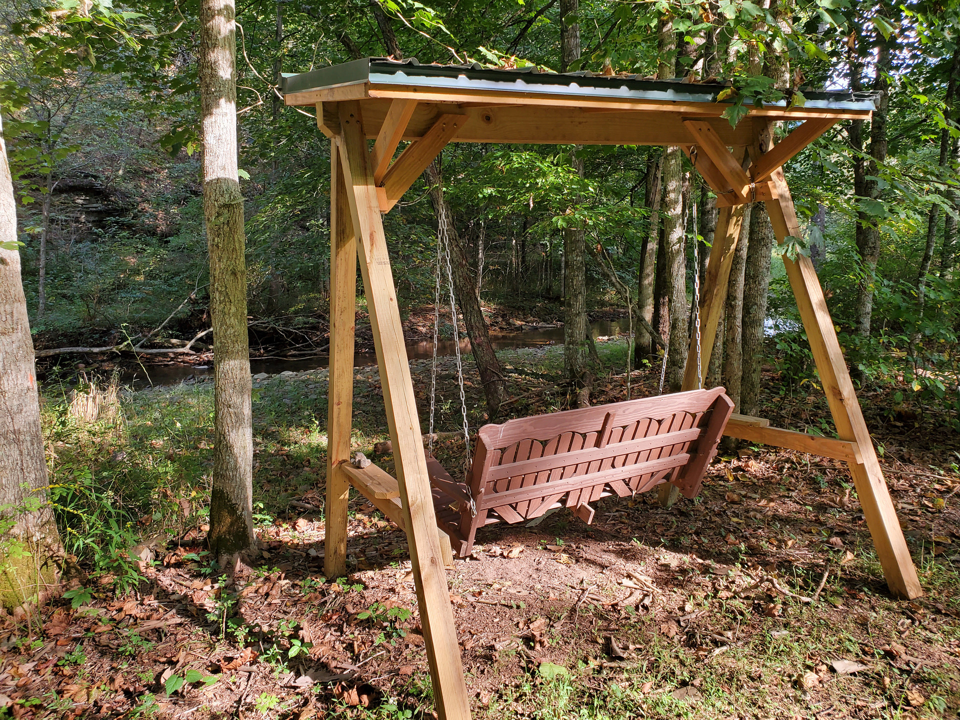 swing over looking creek at one of the campsites.