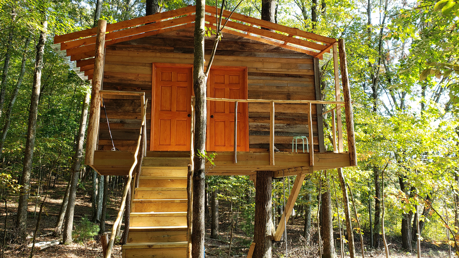 treehouse shower house provides hot showers... it is in the extras. Located at main camp 265 Neck Rd.  not included in price of  primitive sites, but available to all campers in extras