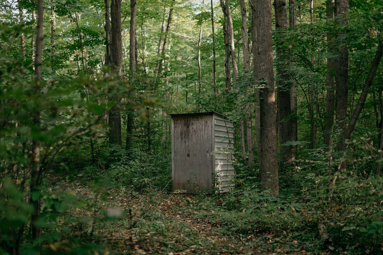 Nestled in the woods near the tent camping is an outhouse which is really nice, especially if traveling in a larger group.