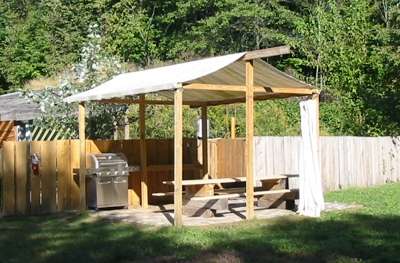 covered eating area in tipi village