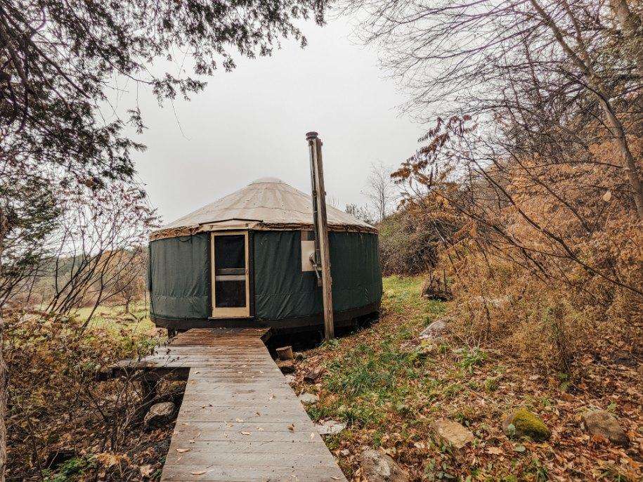 The yurt! The pipe is the exhaust for the woodstove