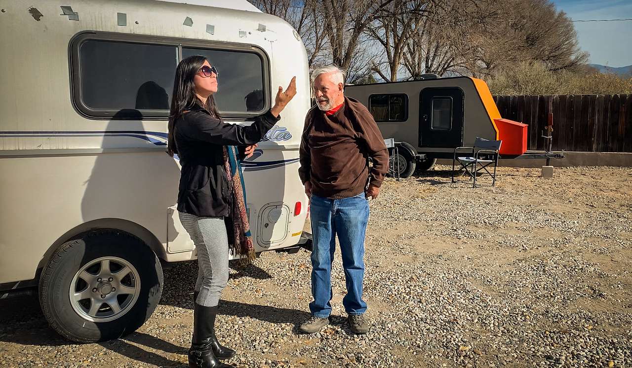 My friend Elsa speaking with the camp host Luis Torres.