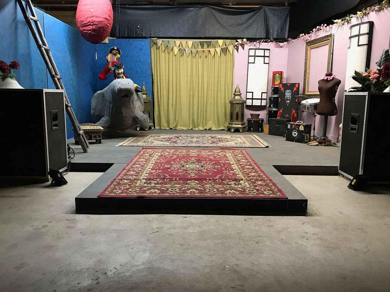 Raised stage area. Complete with manatee and pirate. Ask about seeing the Flea Circus!