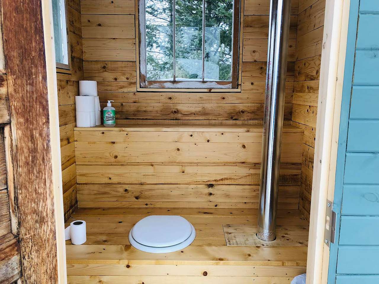 Private outhouse inside.