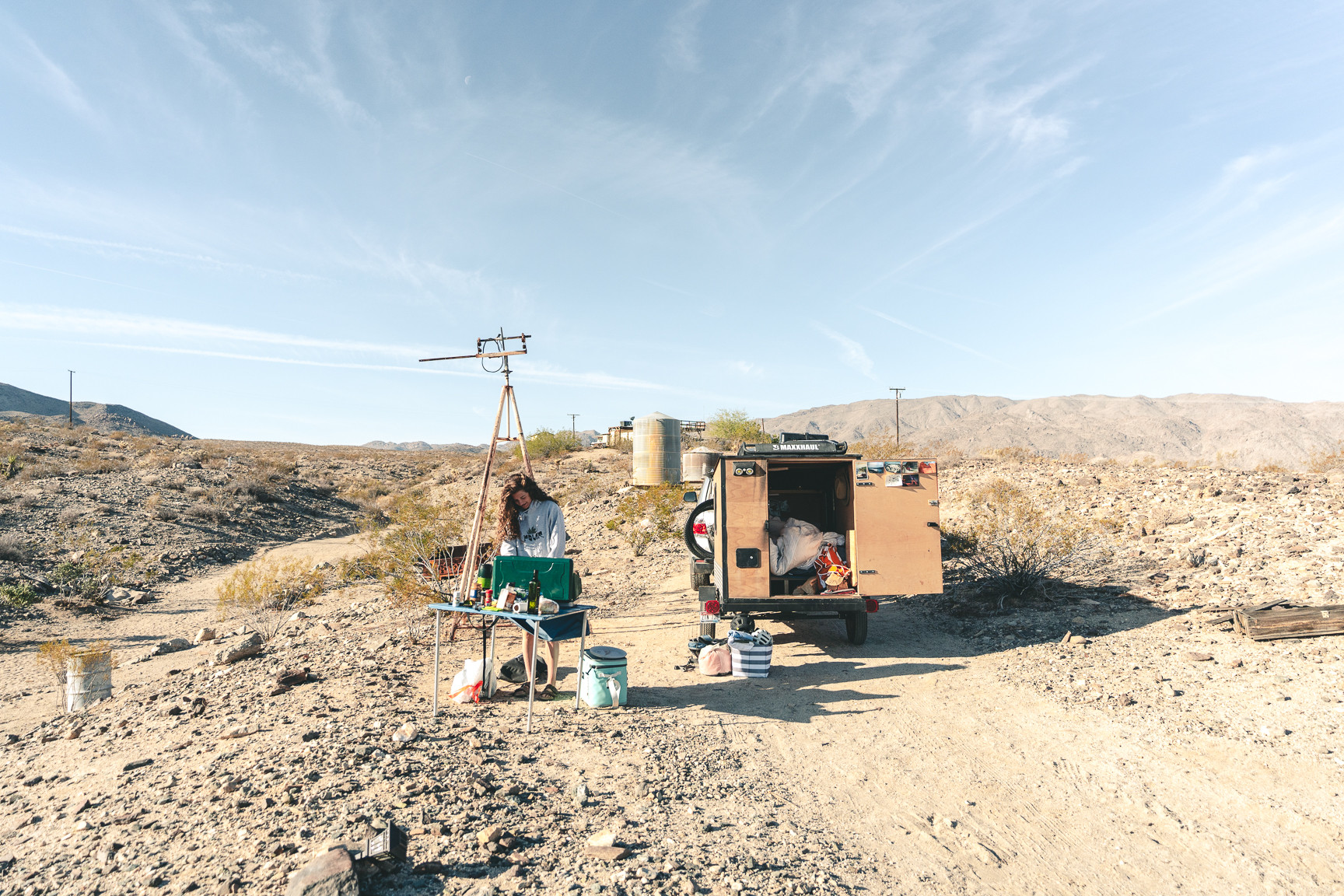 cooking breakfast surrounded by desert mountains 