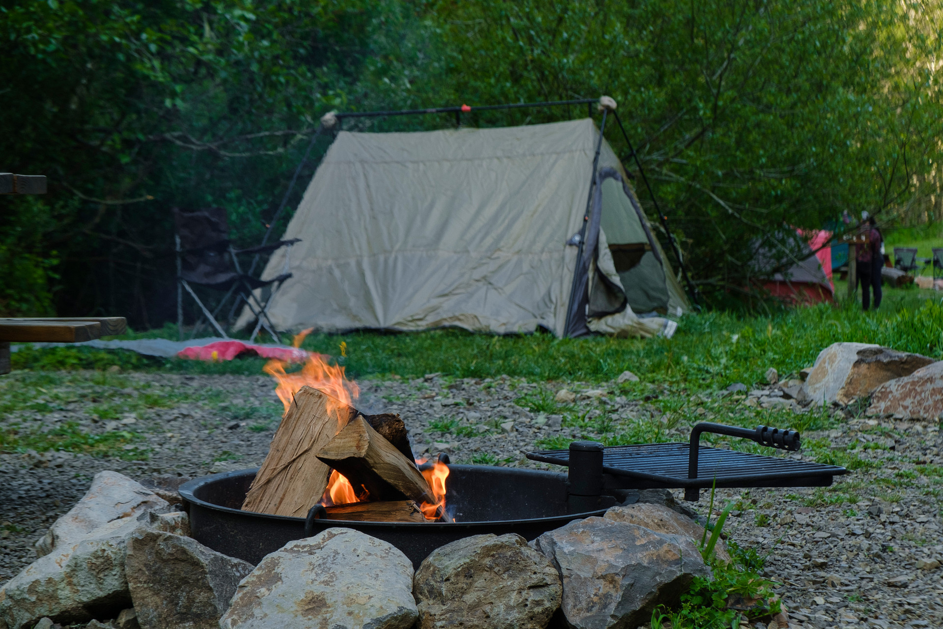 fire pit with swing around grill 