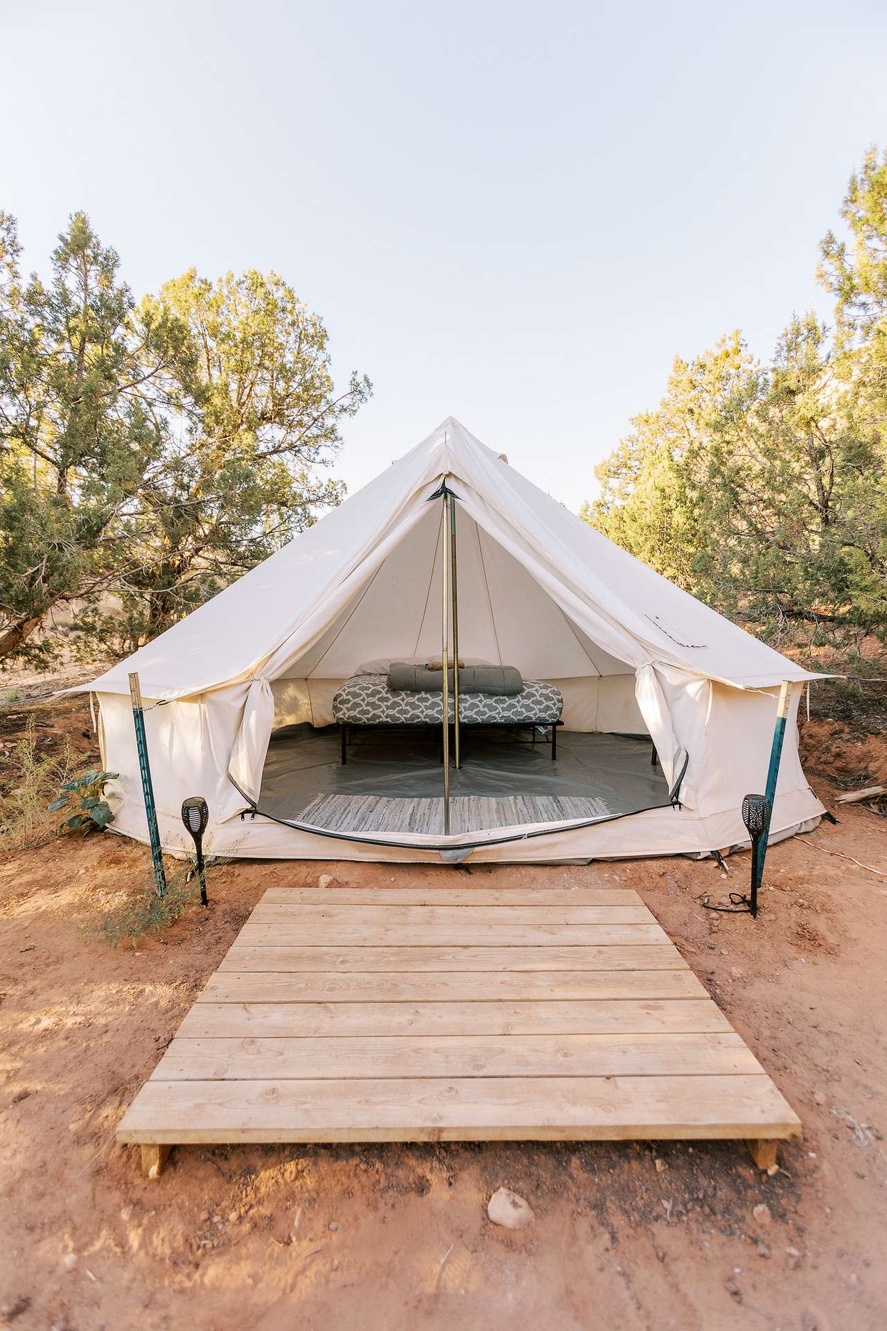 The wooden platform is a great touch to help keep the dirt out.