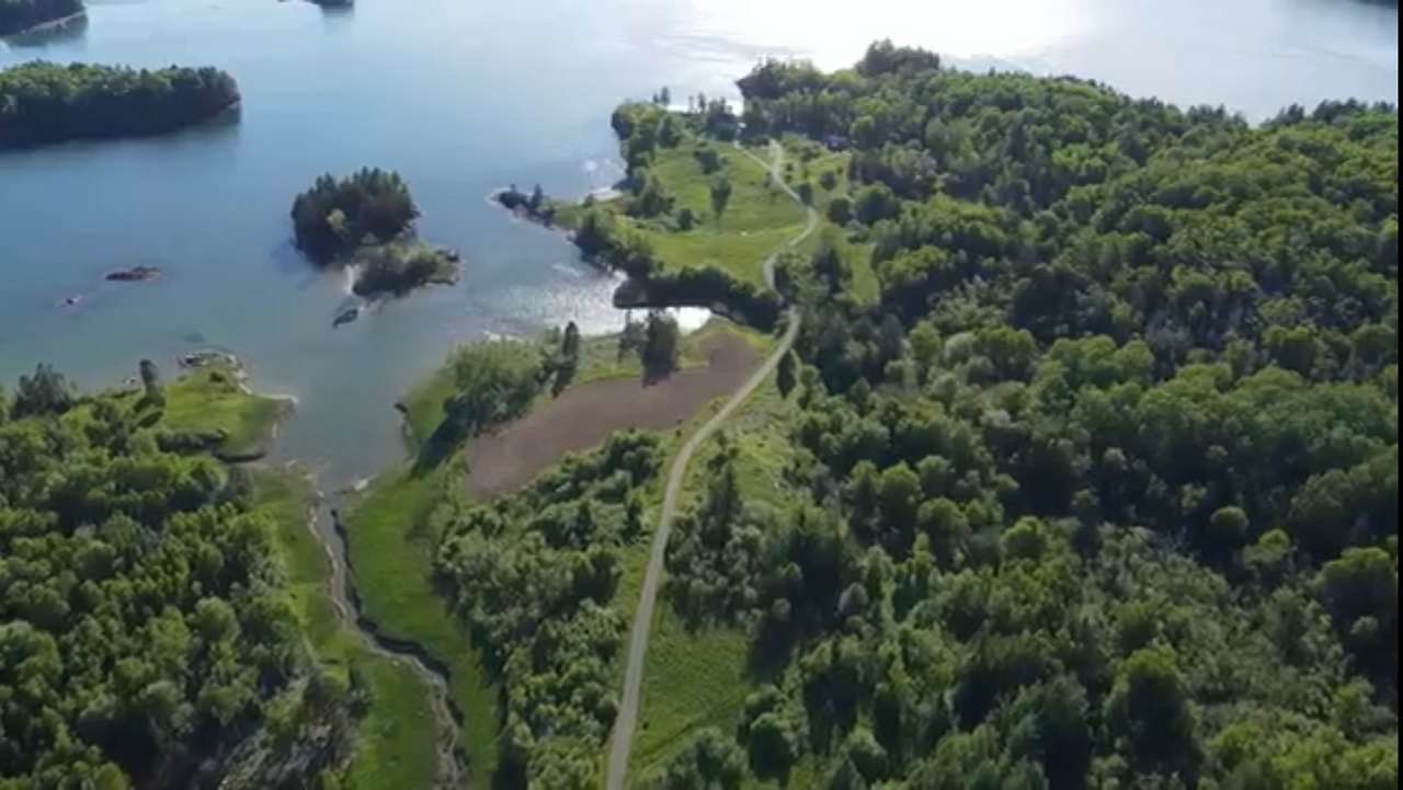 2022-06-10 Aerial view of the Villa Maria Lane.  Marsh Creek to your left.  Line Field next, plowed in preparation of becoming a new camp site.  