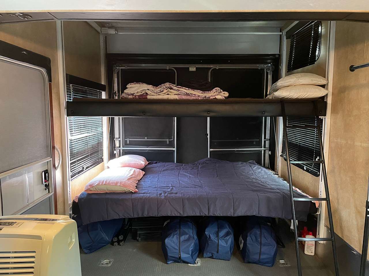 Two queen size beds in separate area 