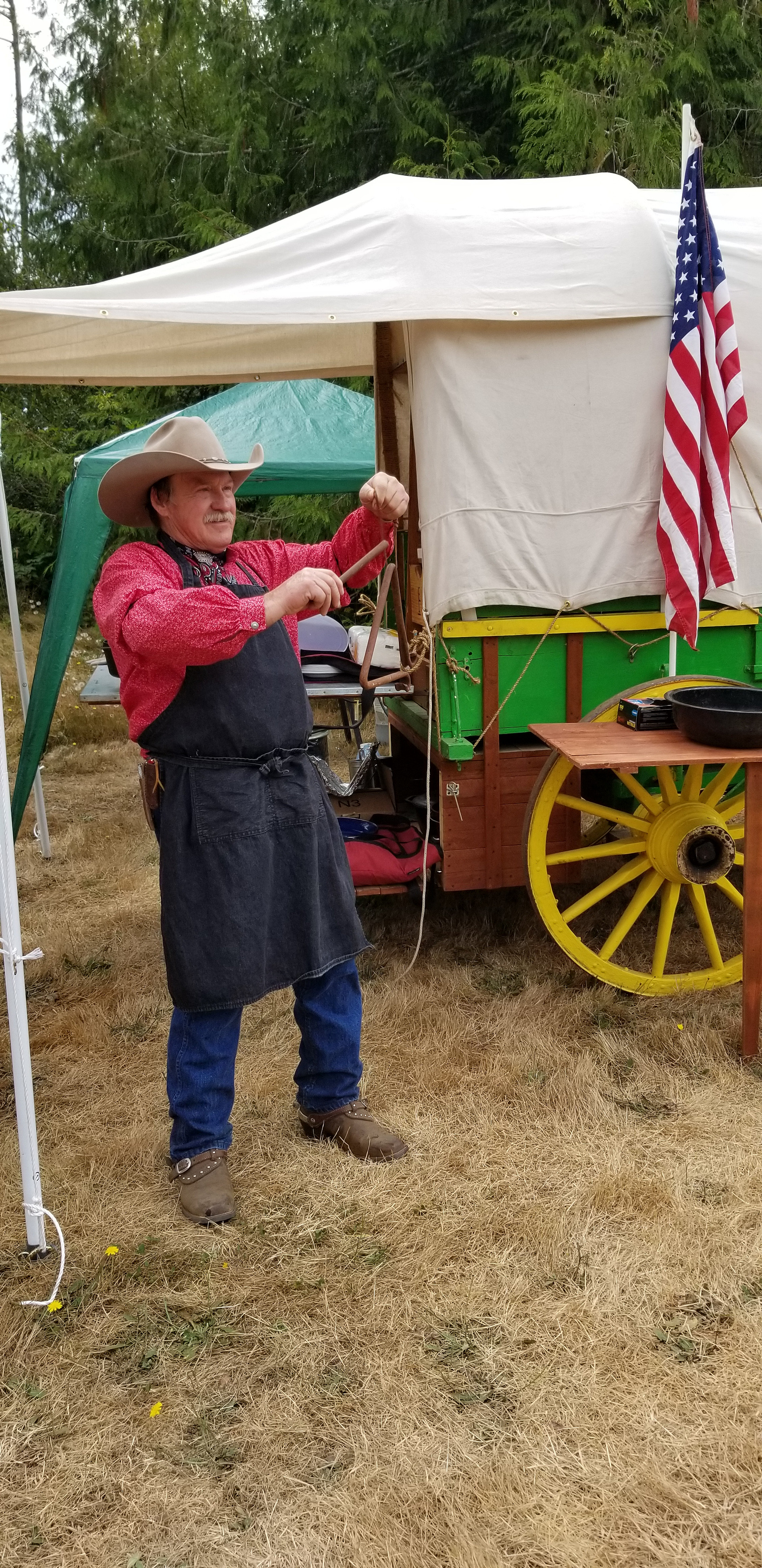Ringing the dinner bell for Chuckwagon dinner :
"Chucks On ! Y'all come and get it !"