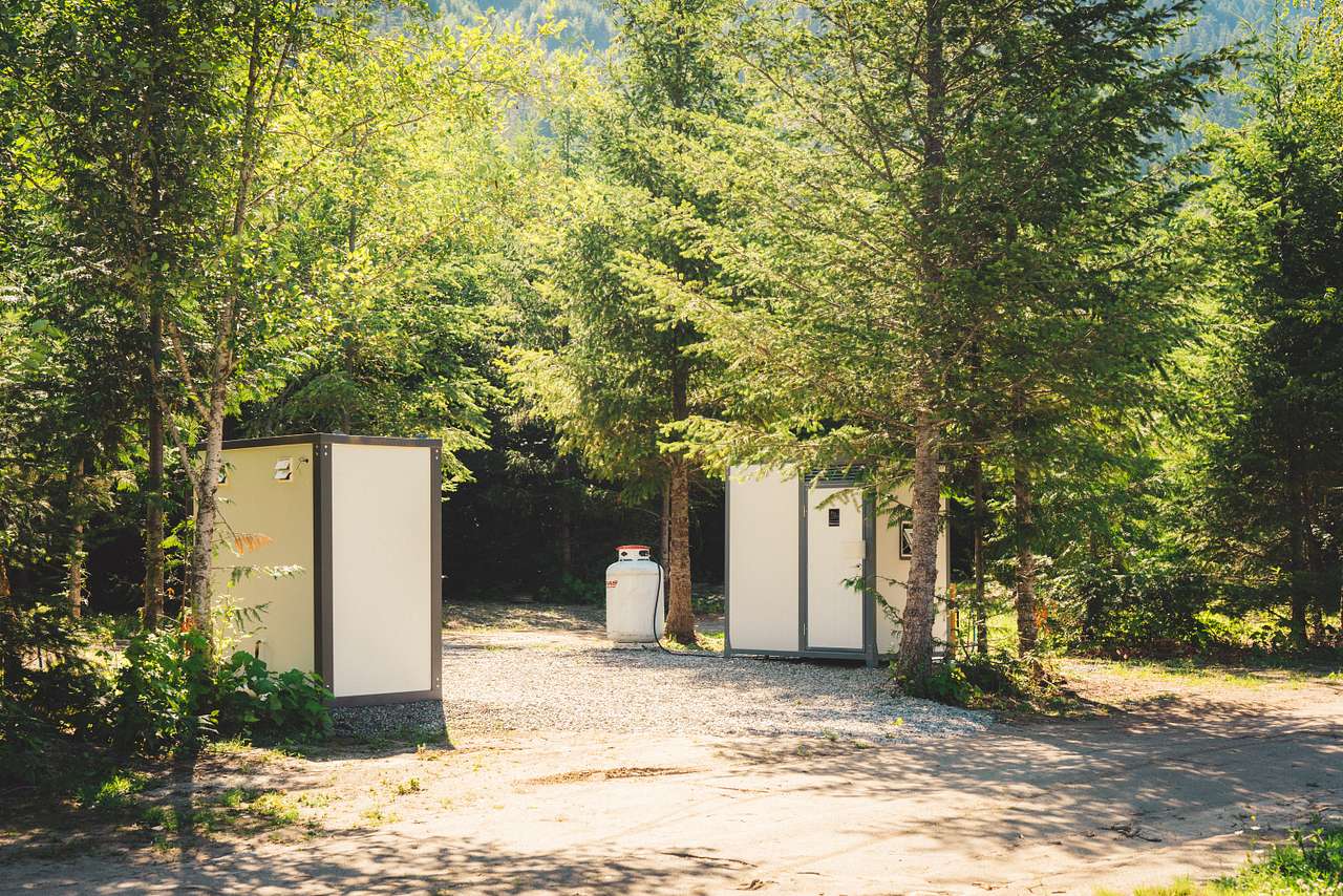 The flushable outhouses and shower. 