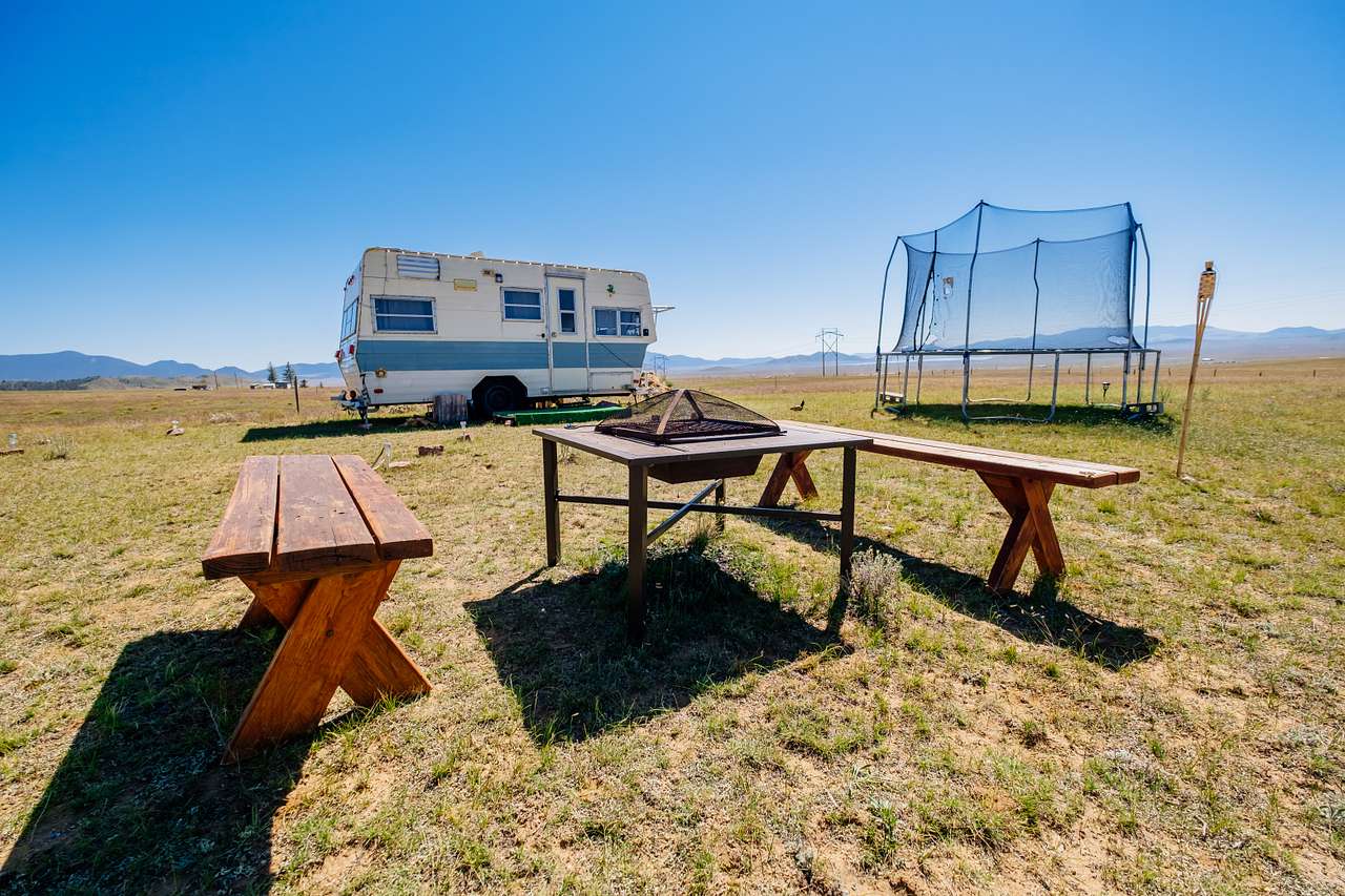 Firepit, trampoline and camper