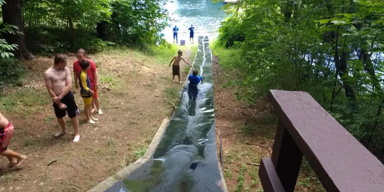 The extremely fast 102 ft slide into the swimming pond! Fun exemplified!