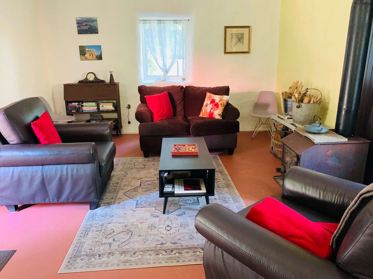 Comfy seating to gather around the wood stove 