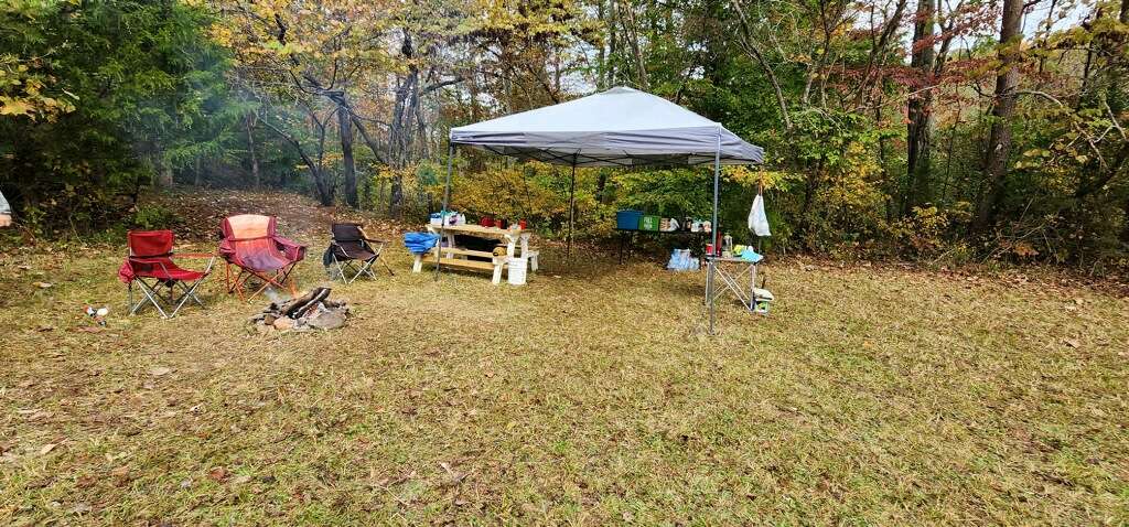 Looking at the camp facing the stream from the feild. 