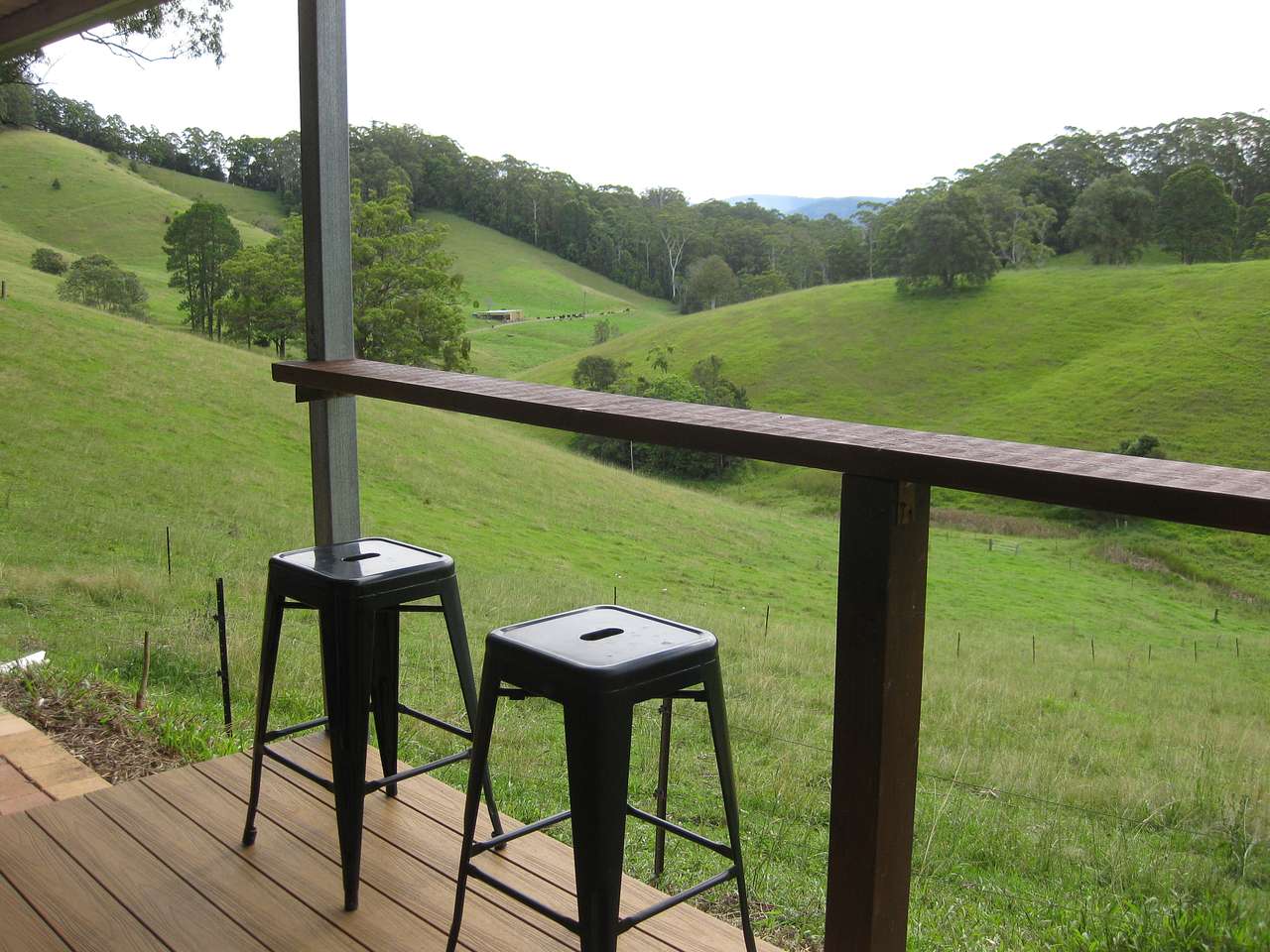 Under cover seating area with bar.