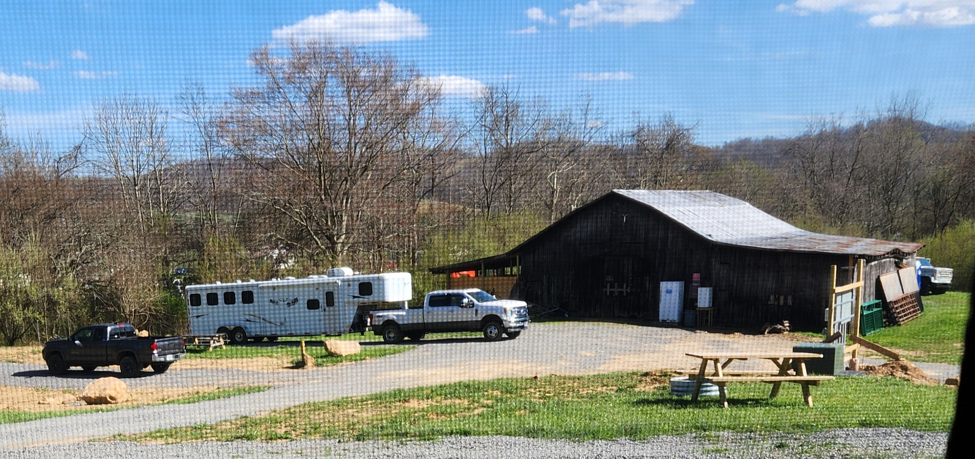 Barn with additional campers with horses.