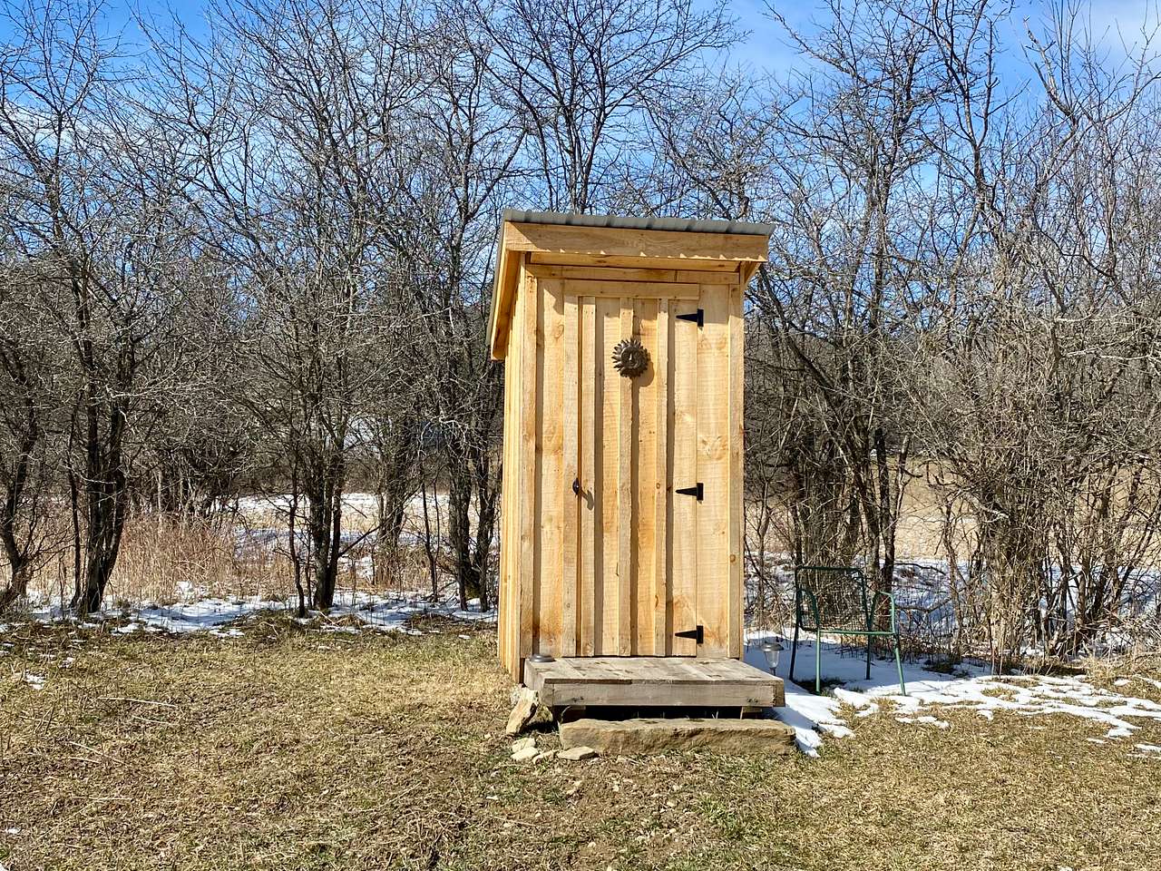 Pit Toilet located close to camping area.