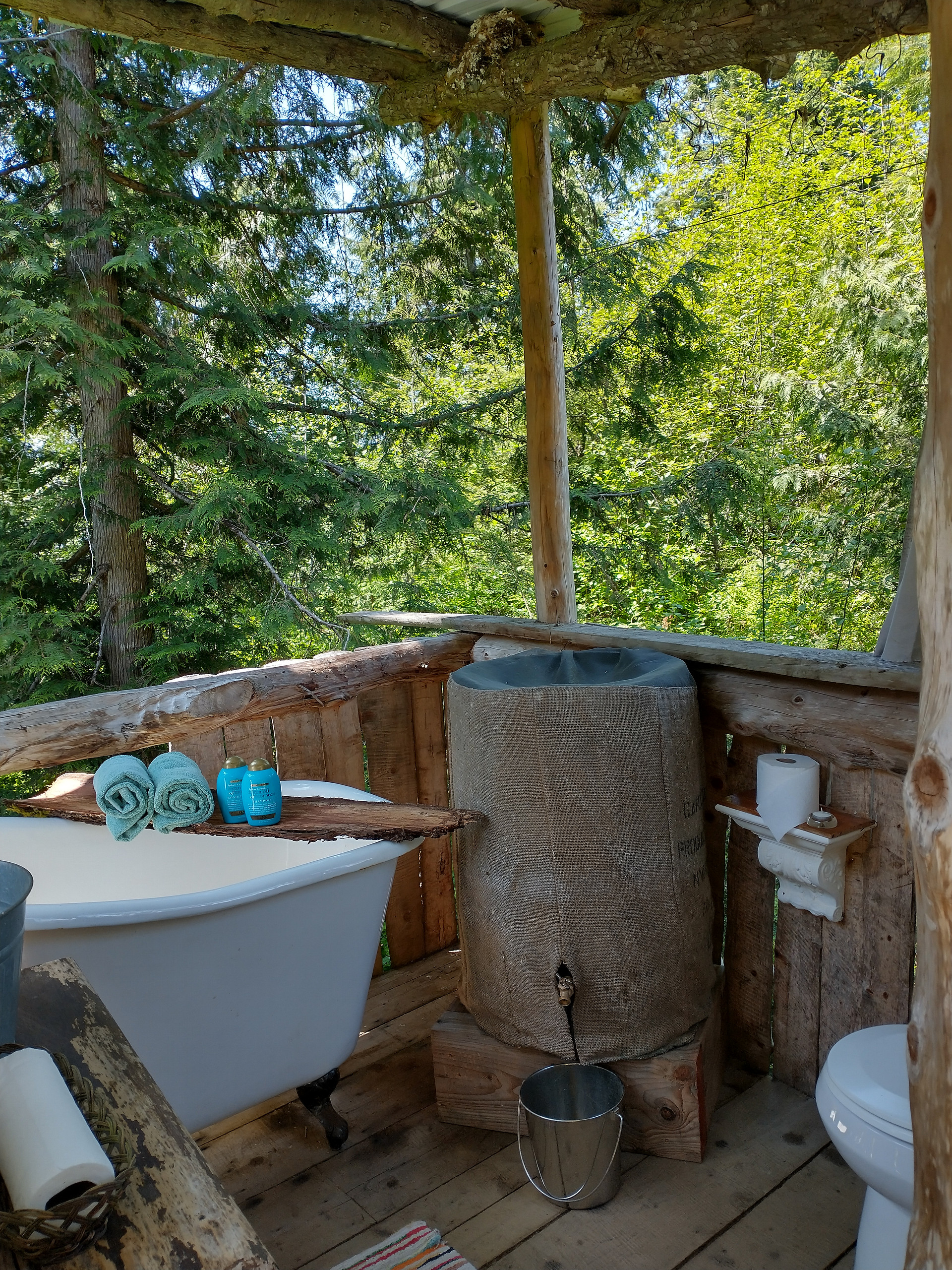 treehouse bathhouse water barrel for flushing and washing