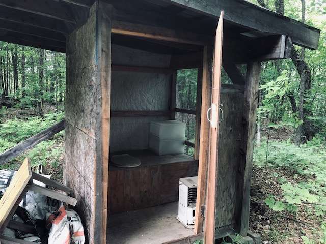 Outhouse, screen protected. 