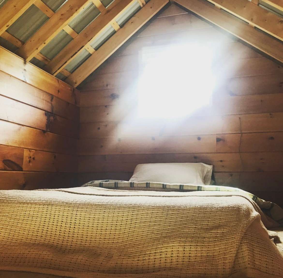 Full-size bed in the loft