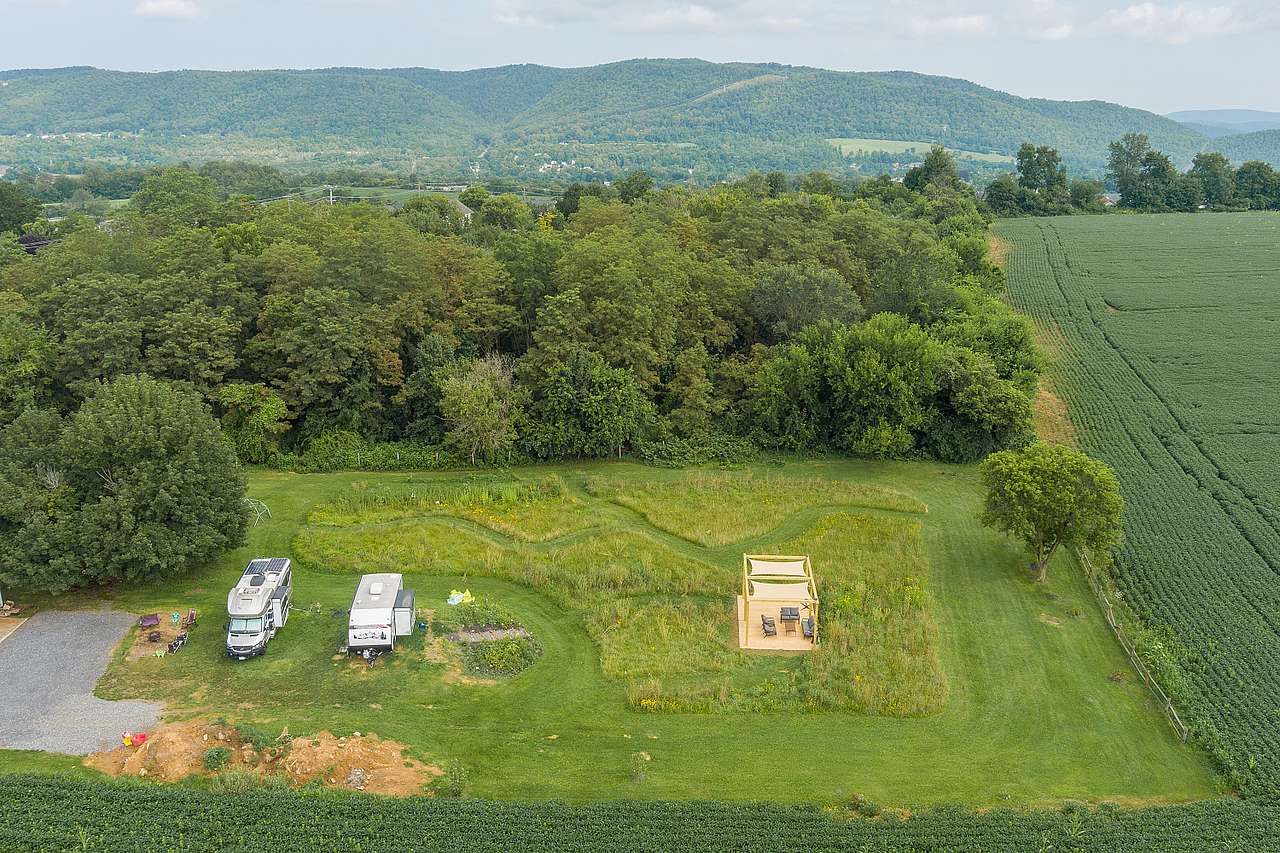 Overhead view of Site 2, Site 1, the meadow, and pergola.