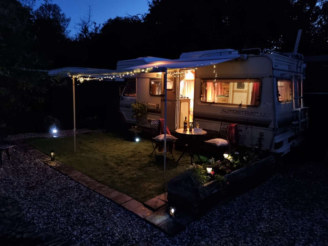 The evening patio area, with soft lighting.