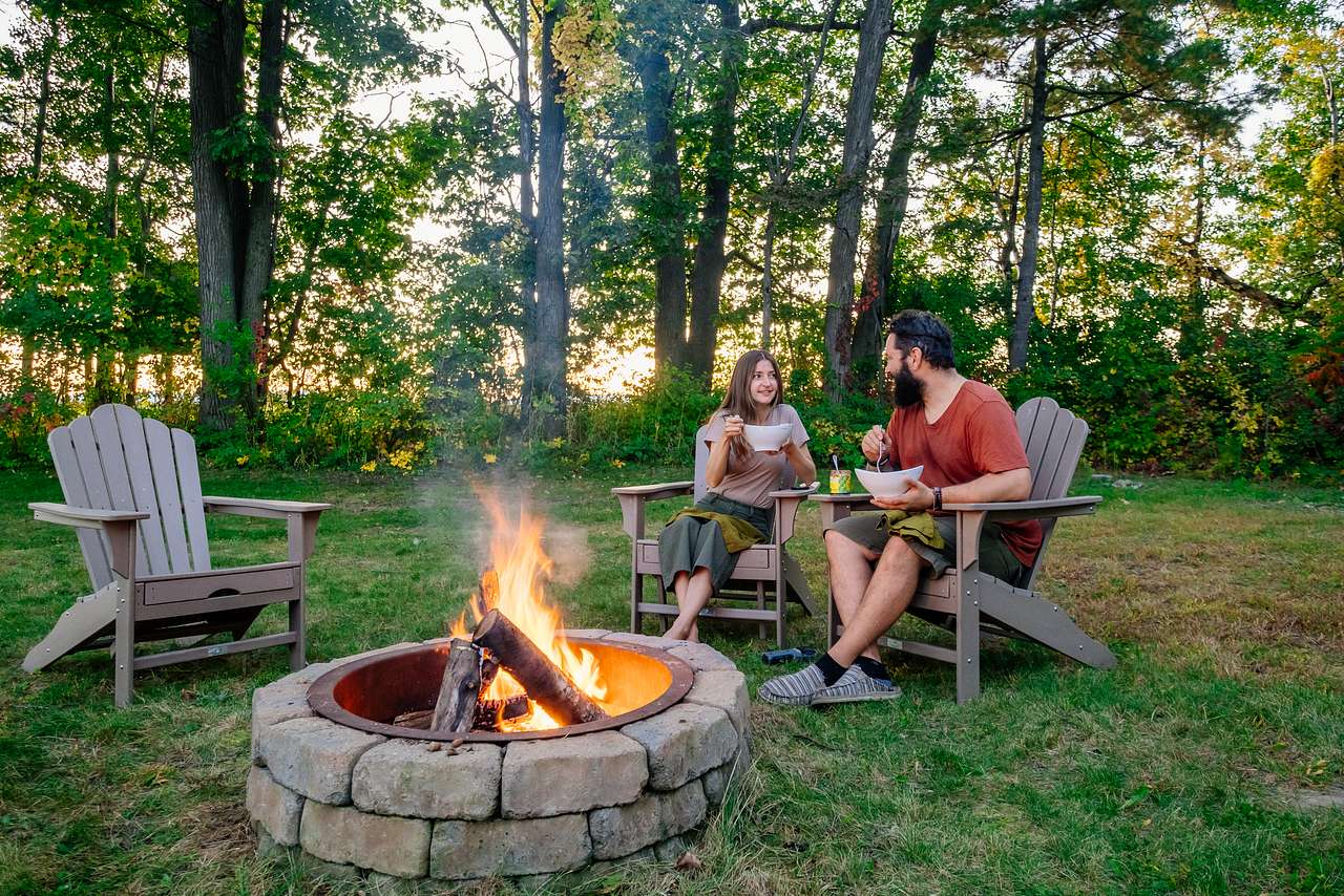 Enjoying dinner by the fire and setting sun