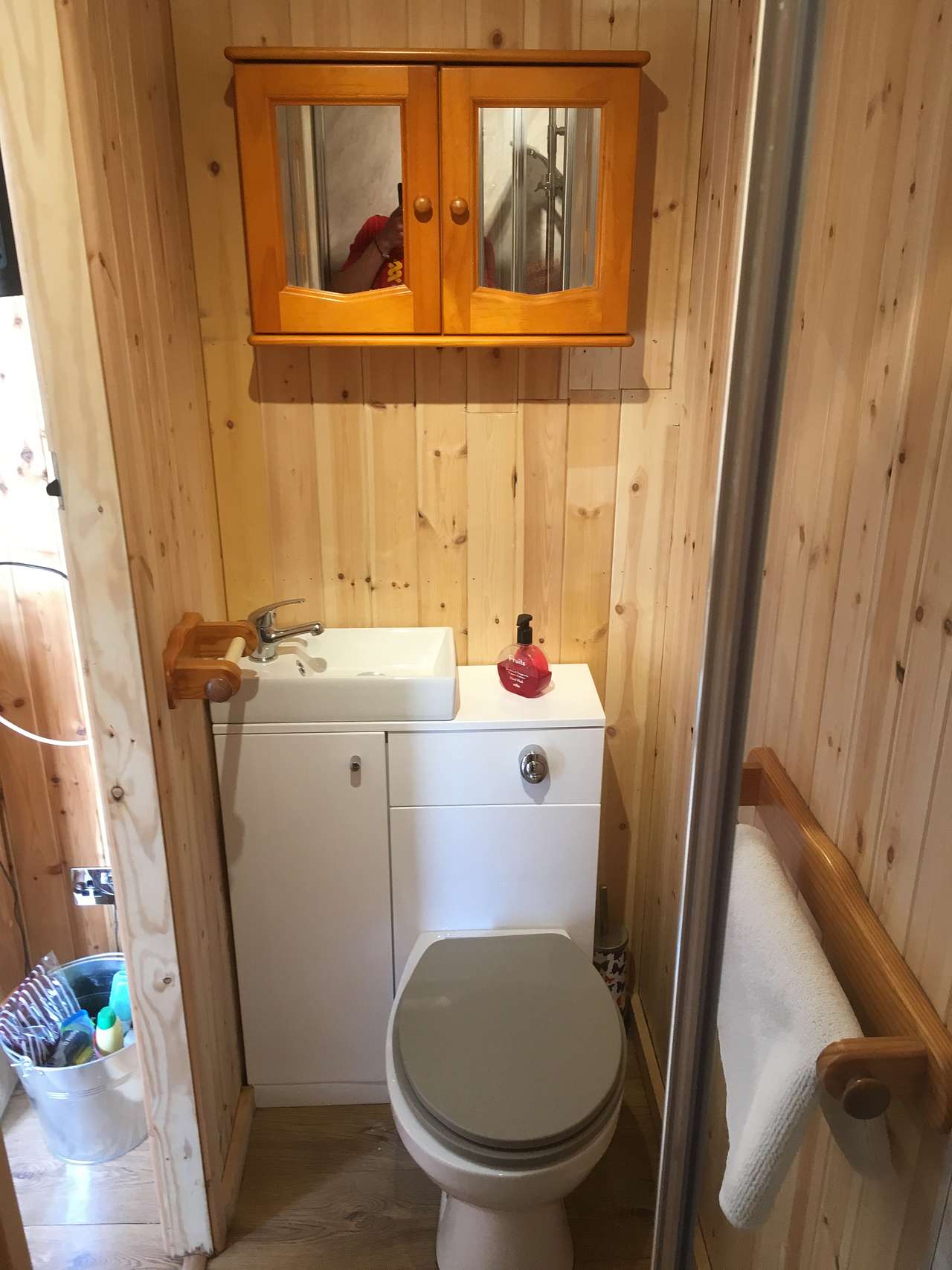 Toilet and basin in ensuite in carriage. 