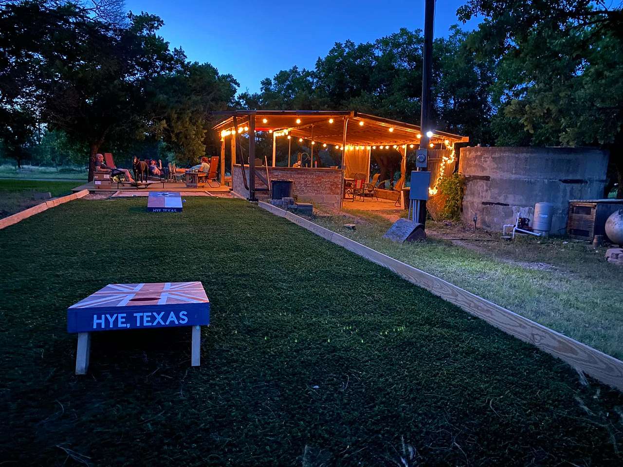 Enjoy sitting out under the stars on the patio. Eat dinner in the covered outdoor kitchen, or play corn hole or Bocci ball on the sport court.