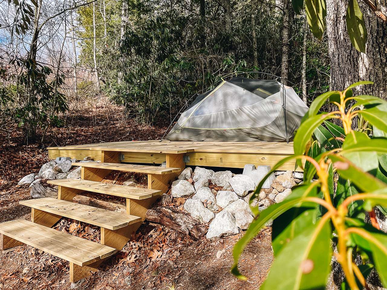 A sturdy and large platform for your tent or sleeping setup.