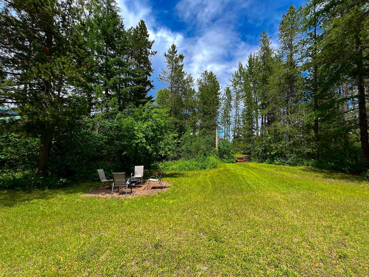 Current photo of site. Can fit any size camper. Fire pit available as weather allows 
