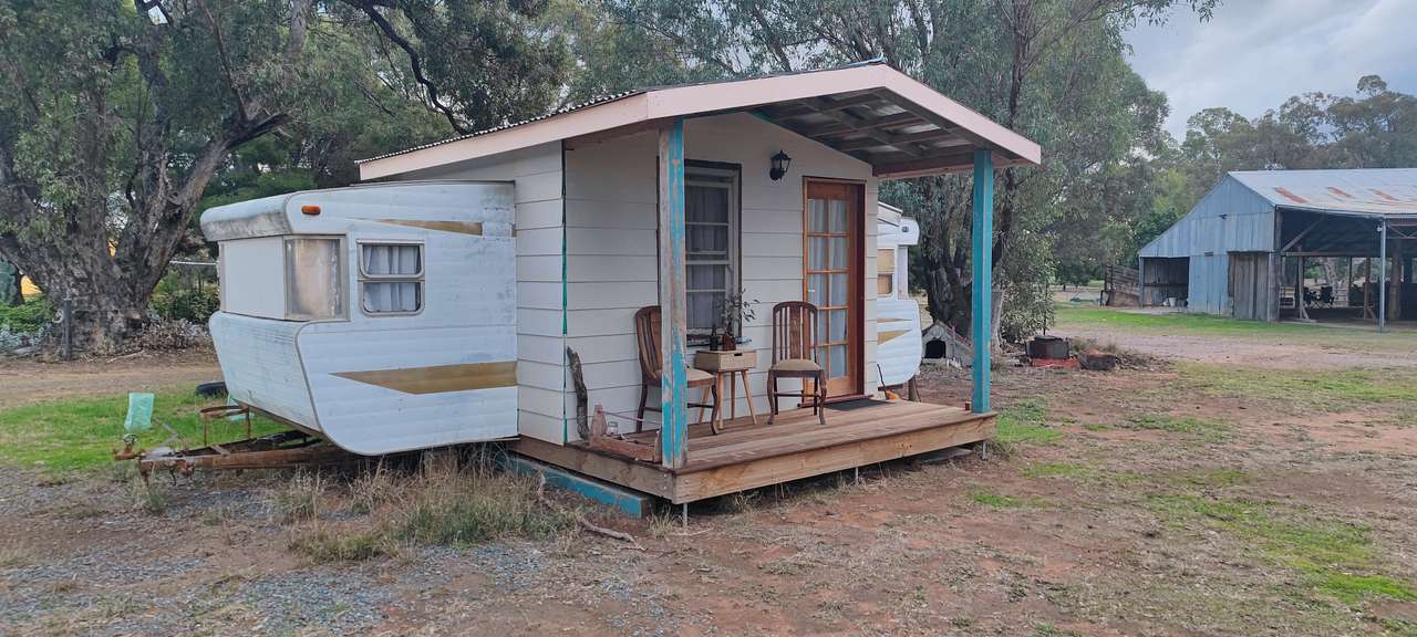 Caravan with Queen bed and fold out bed.