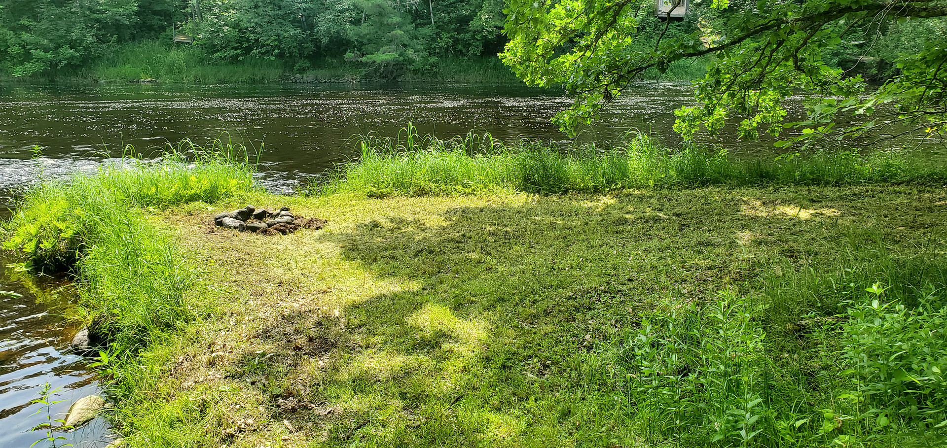 Tent site looking South, swimming (sandy area) hole on the left, rapids straight ahead.
