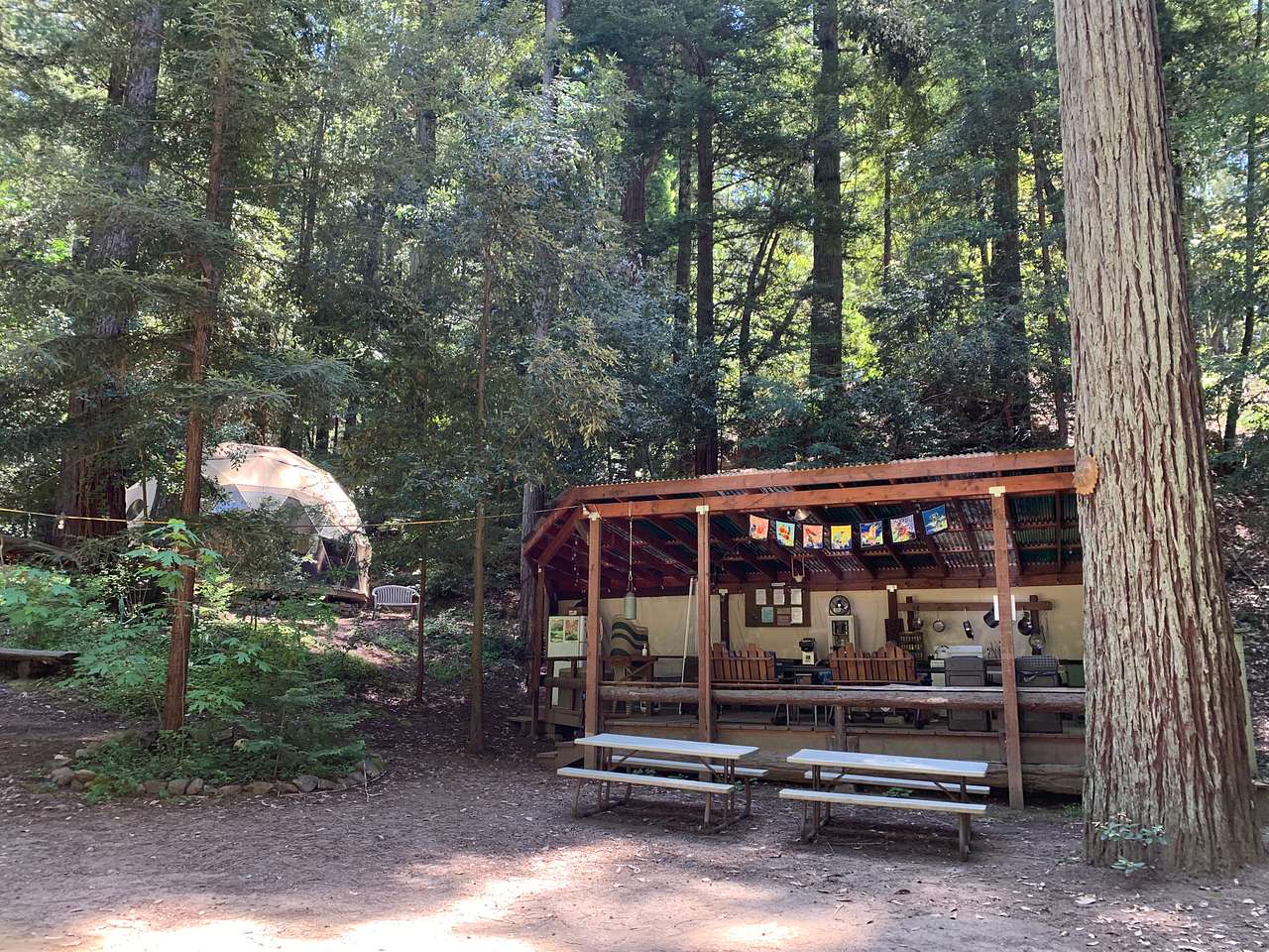 The outdoor kitchen with Eagle’s Nest/Game Dome in the background 