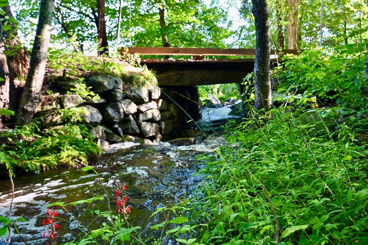 The hand hewn stone bridge, likely built in the late seventeen hundreds. This road used to be the main road in to Wolfeboro.