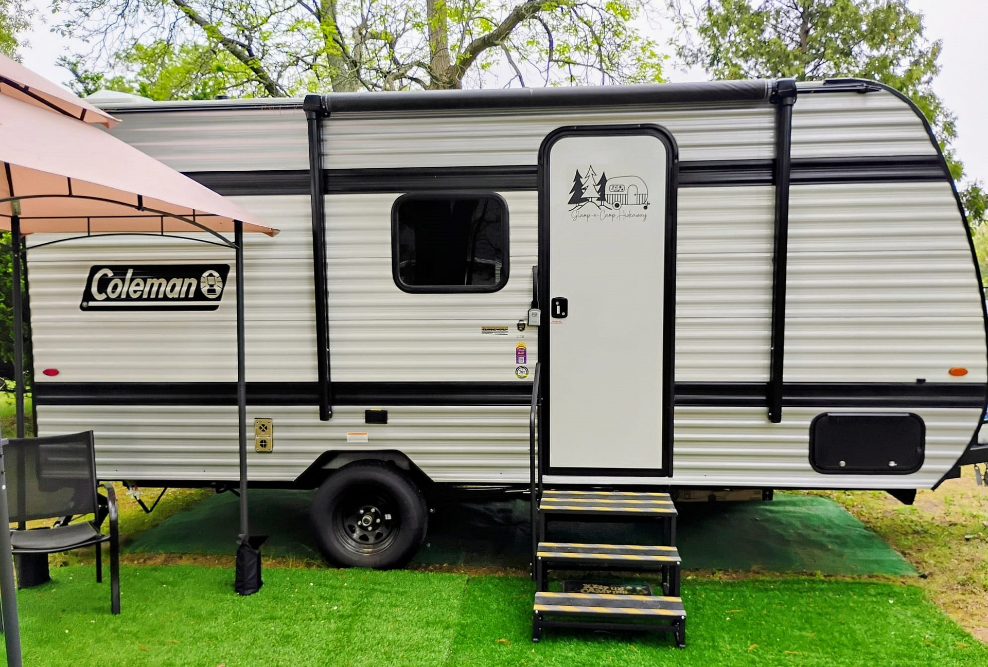 Brand new 2025 16.5-foot camper featuring a full kitchen with microwave, fridge, propane stove, and sink, plus a dinette, full bathroom, and A/C. Comfortably sleeps 4.