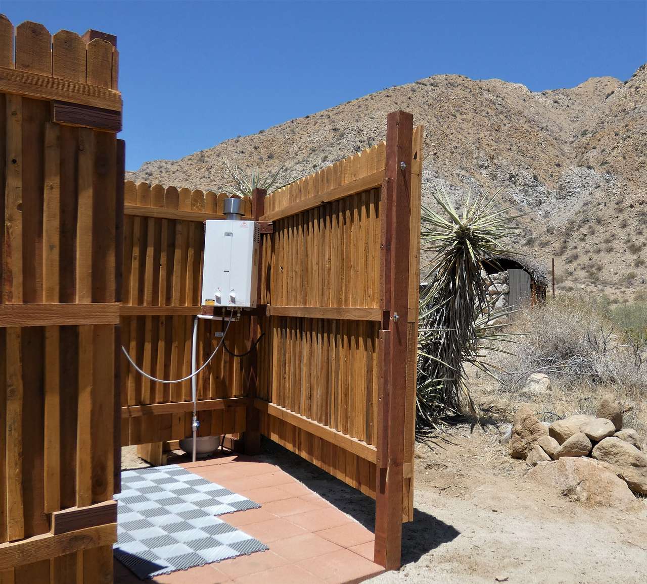Enclosed outdoor shower. 