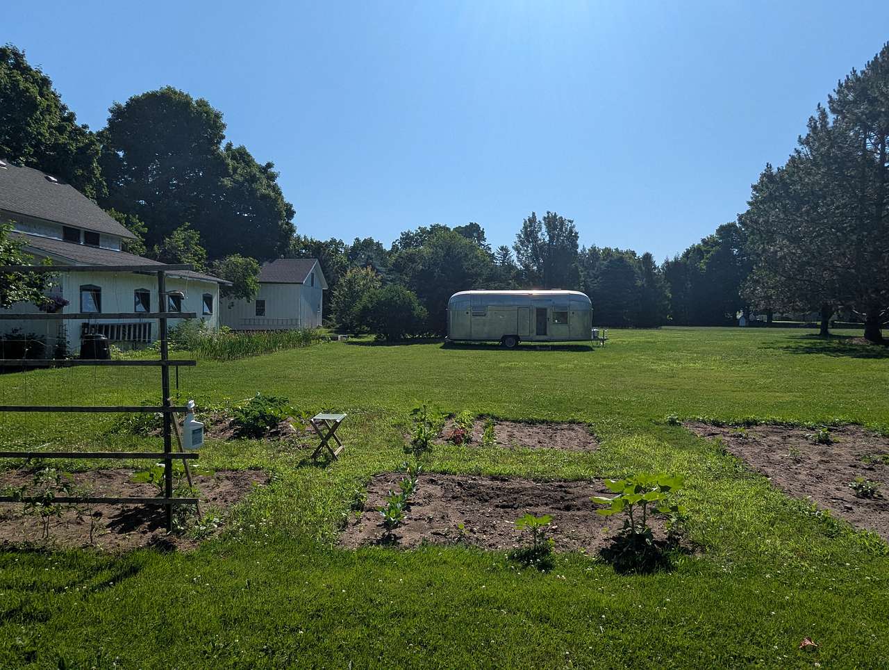 View from the garden. Our yard is mostly private. We have great neighbors who you may occasionally see working in their yards. 