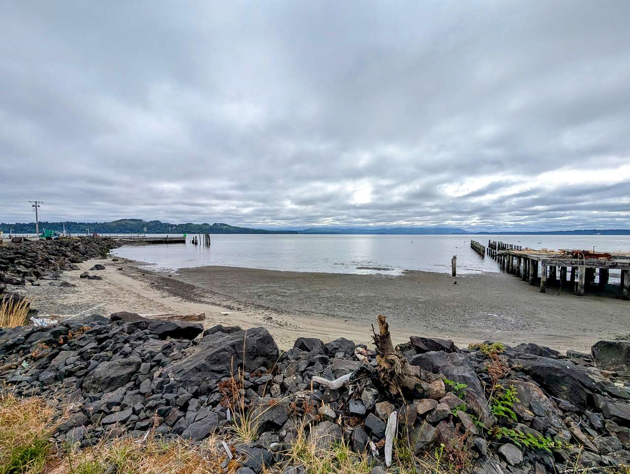 Low tide, we saw beachcombers and clammers out