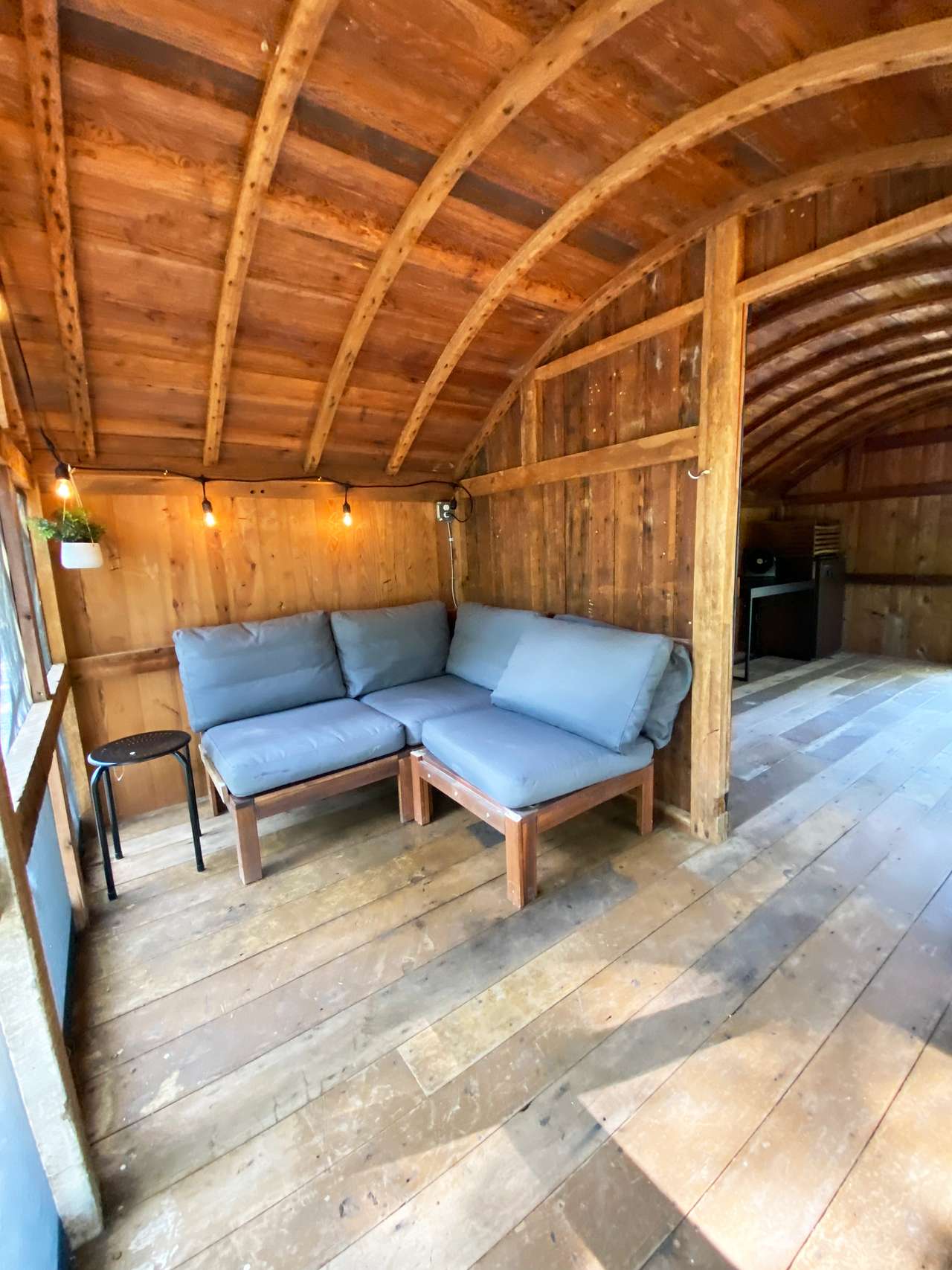 The Roundtop screened porch and living area in the distance.