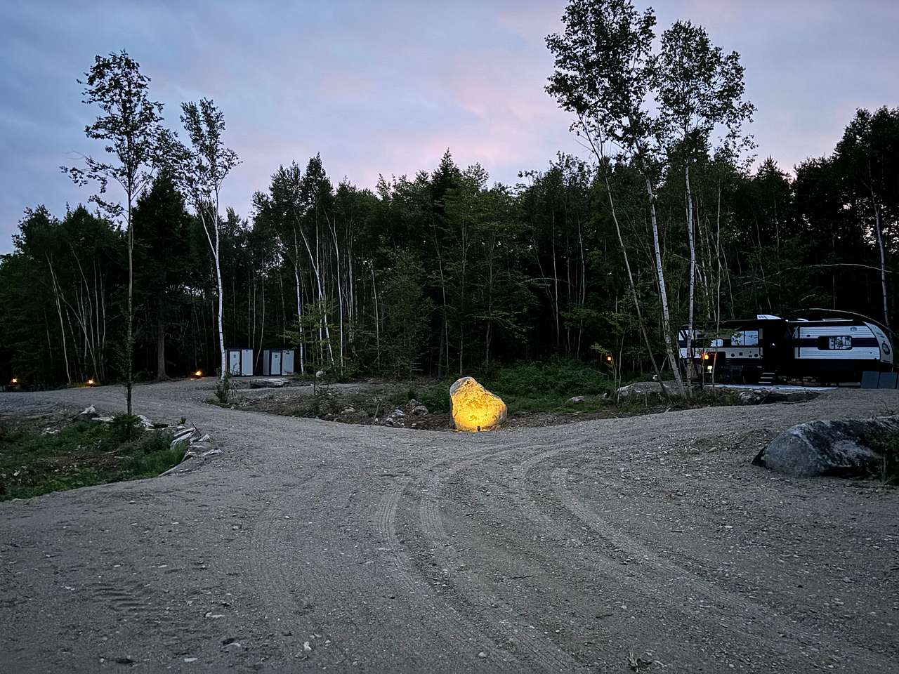The rv is also rented out.  The tent site is down the left side.