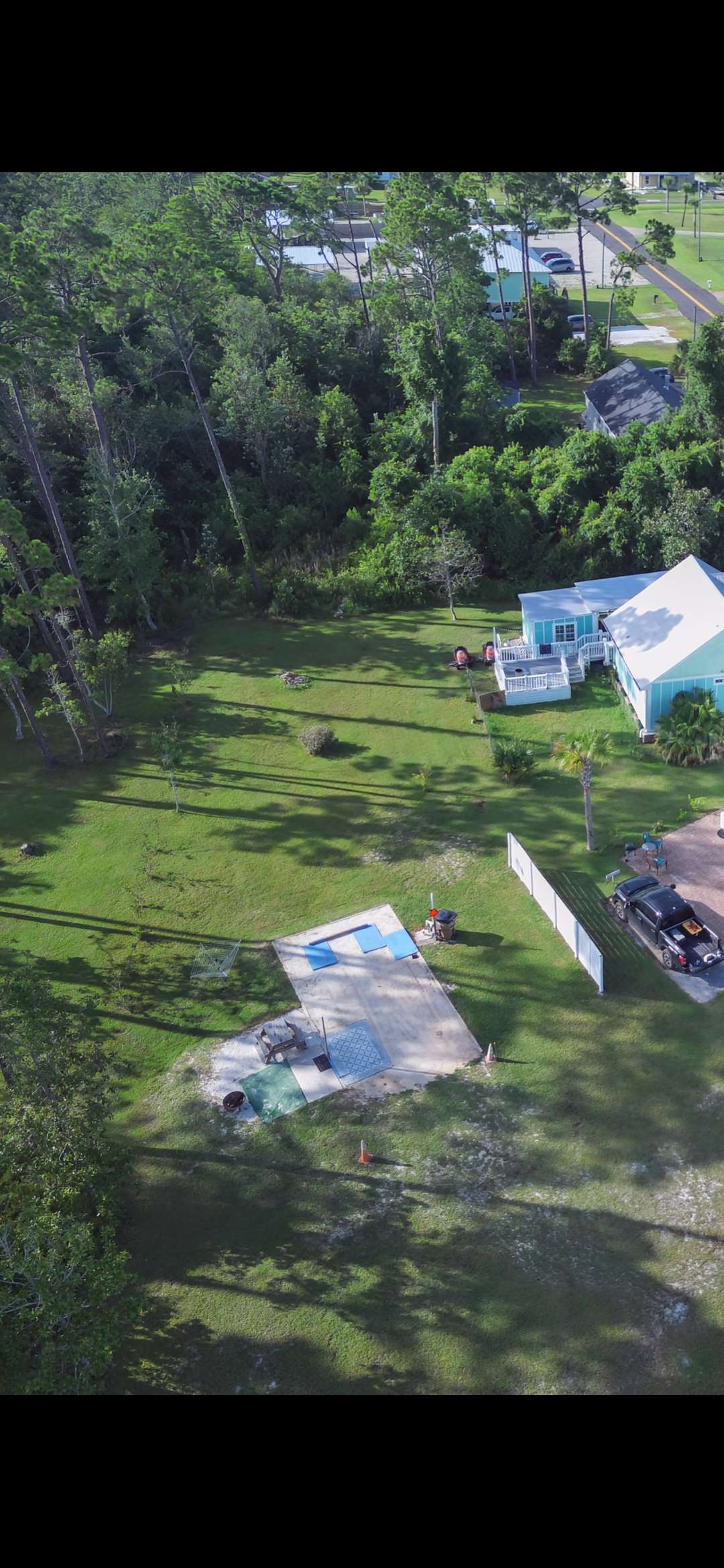 St Joe Beach with outdoor shower and concrete pad