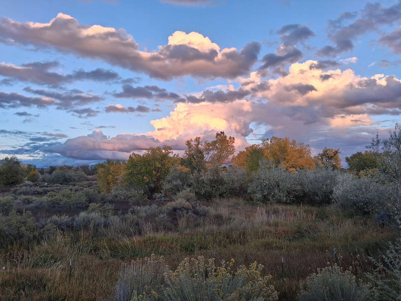 View across property with award-winning sky, to Four Corners' Dragonfly Camp on far left. Most of camp is not visible here. 