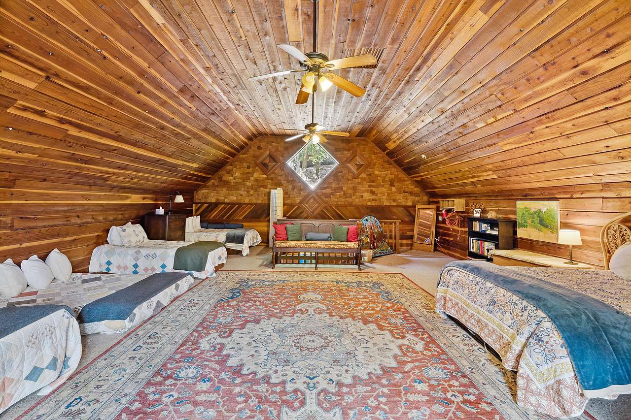 Loft.
Can sleep 11: 3 queen, 1 double, and 3 twin beds.