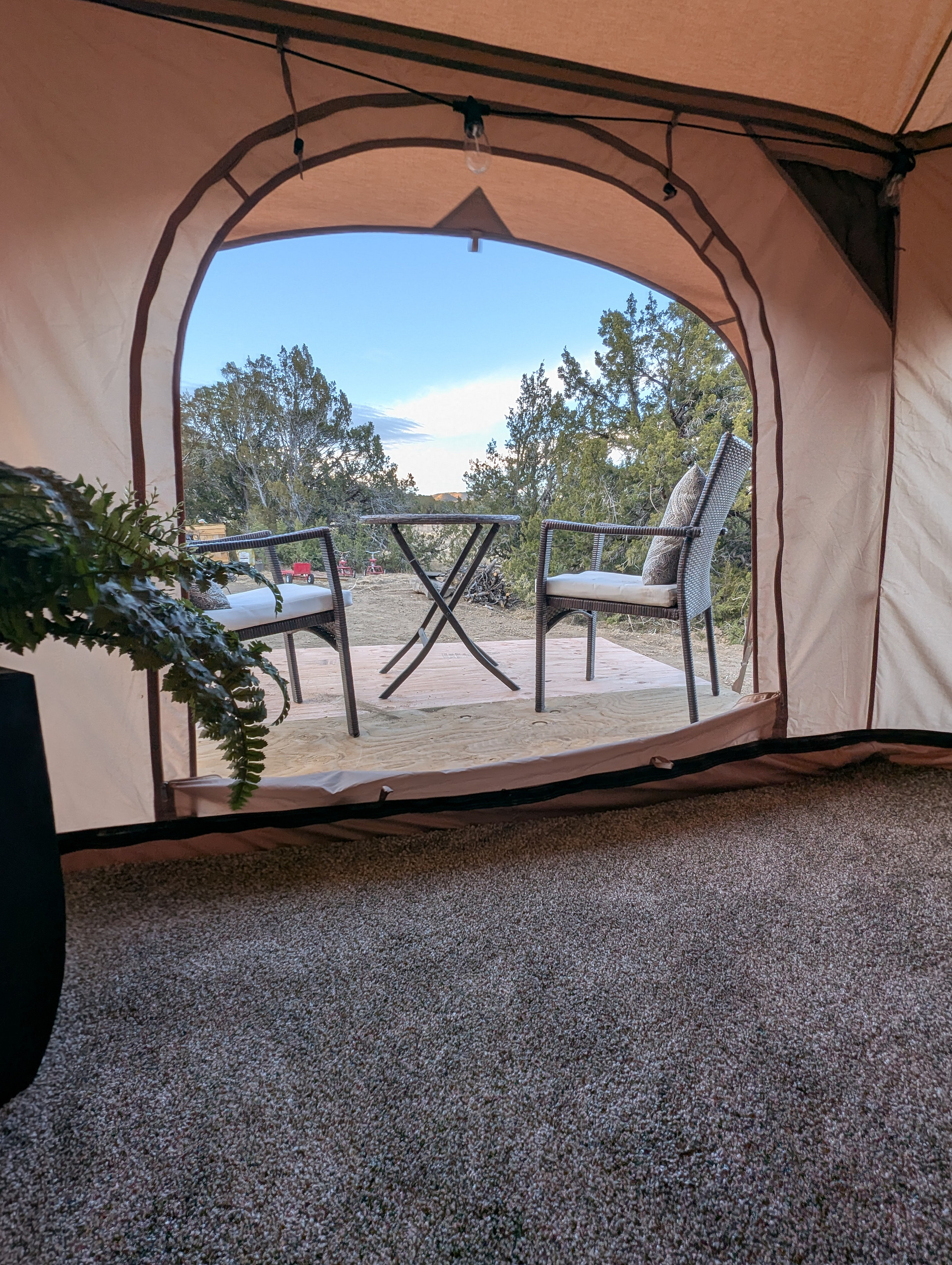 Inside view of bistro set and deck. 