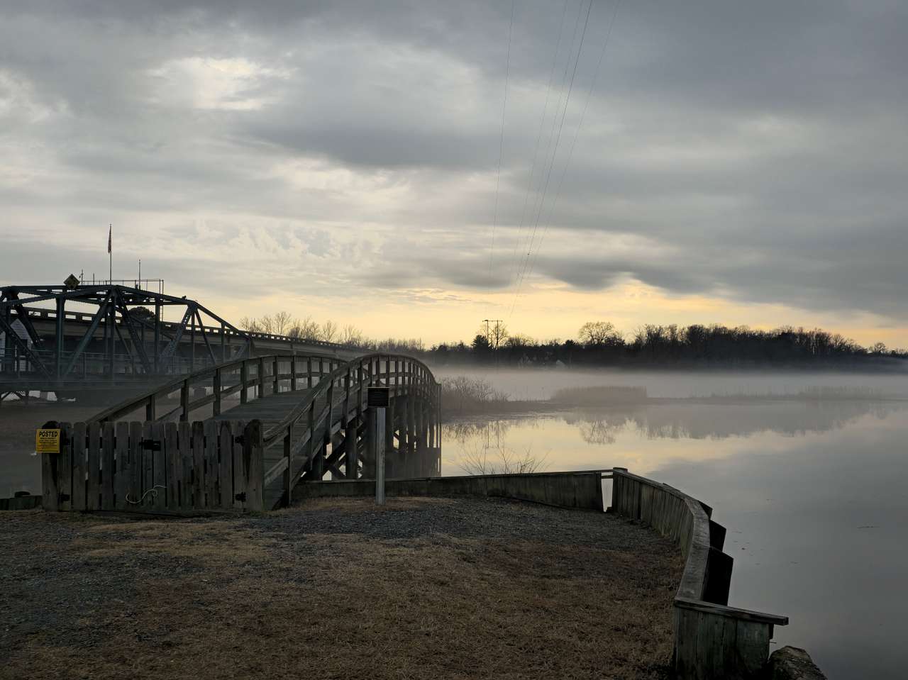 Public river access and scenic waterfront views are located just a short drive from the property.