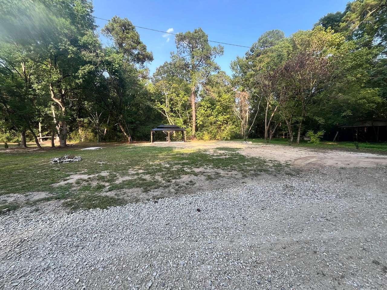 Camping area. Sites 1-3 in this area. The outdoor living space is pictured in the center. 