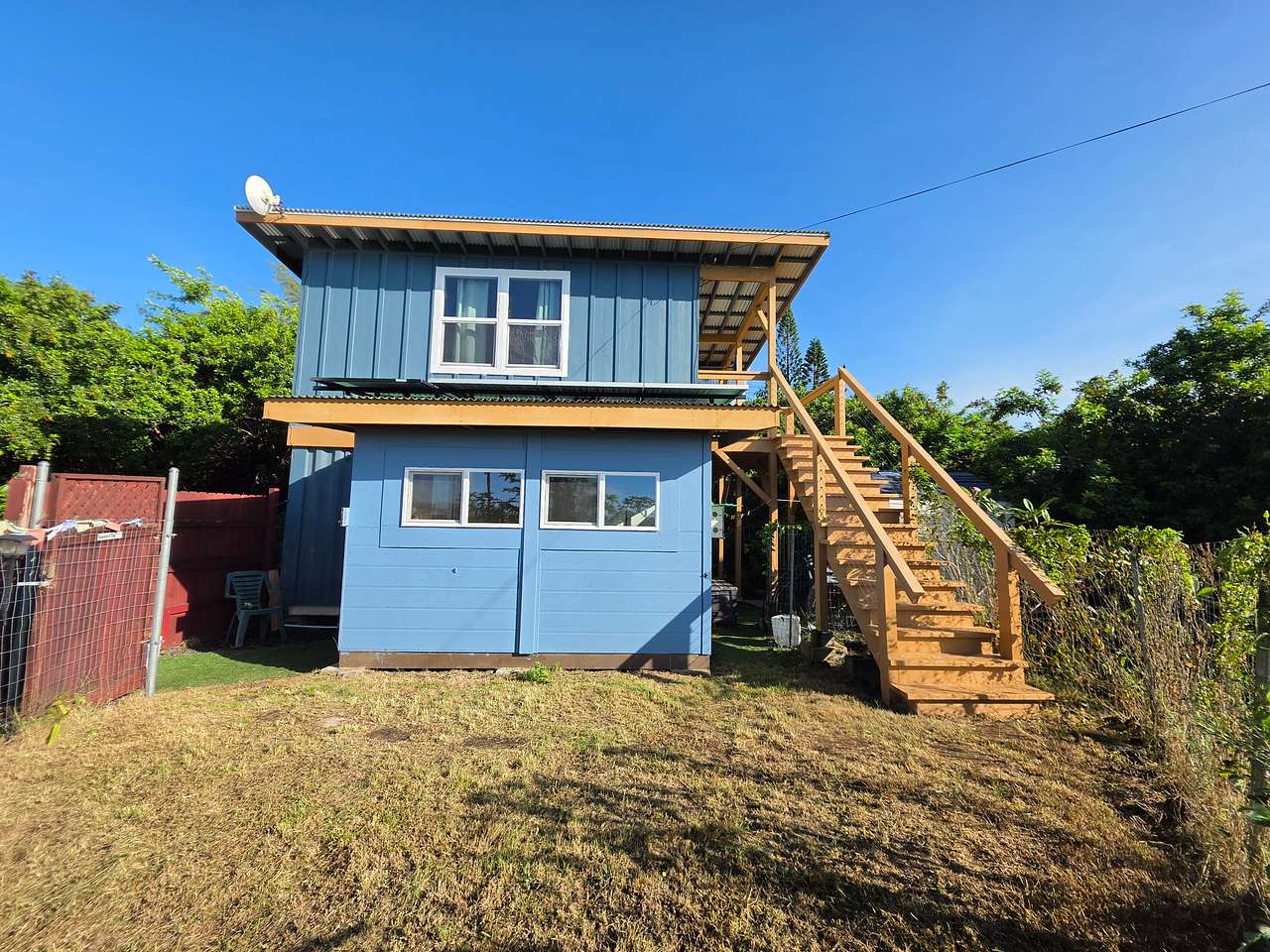 2 story cottage with solar and county water. 
